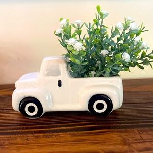 Decorative Ceramic white farm truck with flowers.